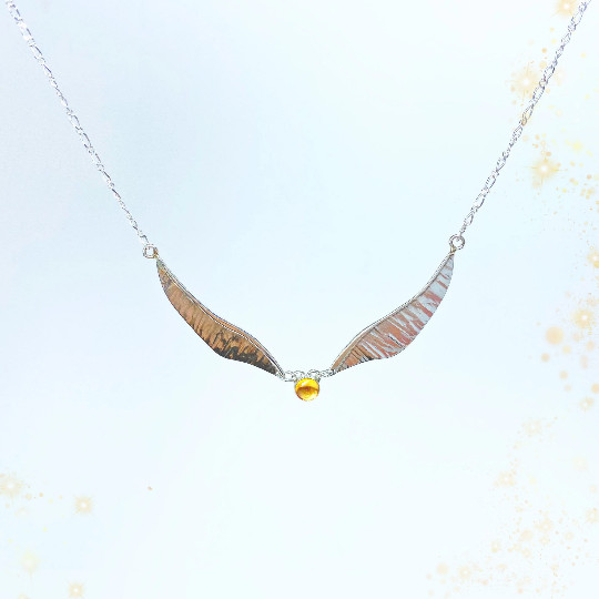 Golden Wing necklace handmade in sterling silver.